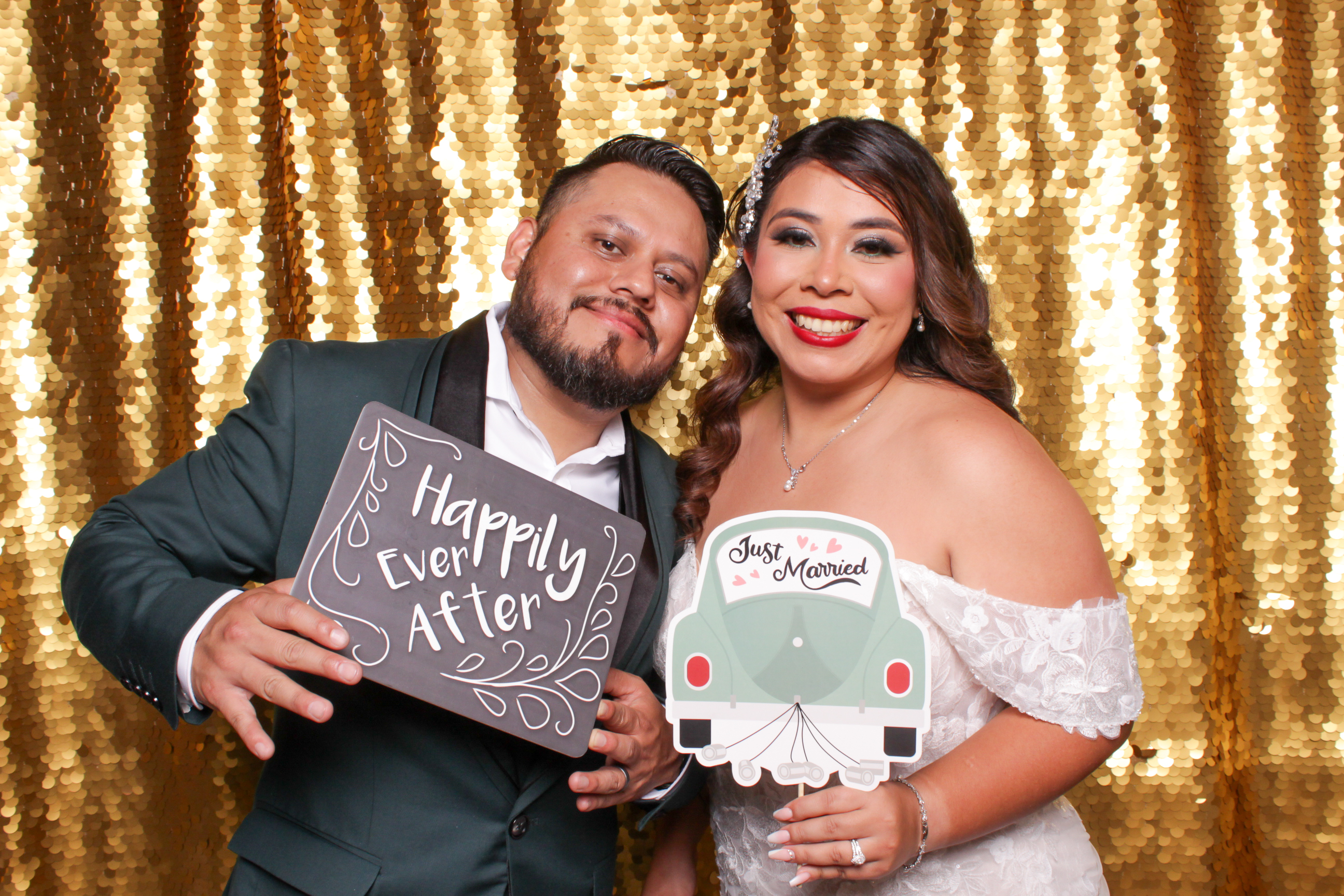 Wedding photo booth couple with props