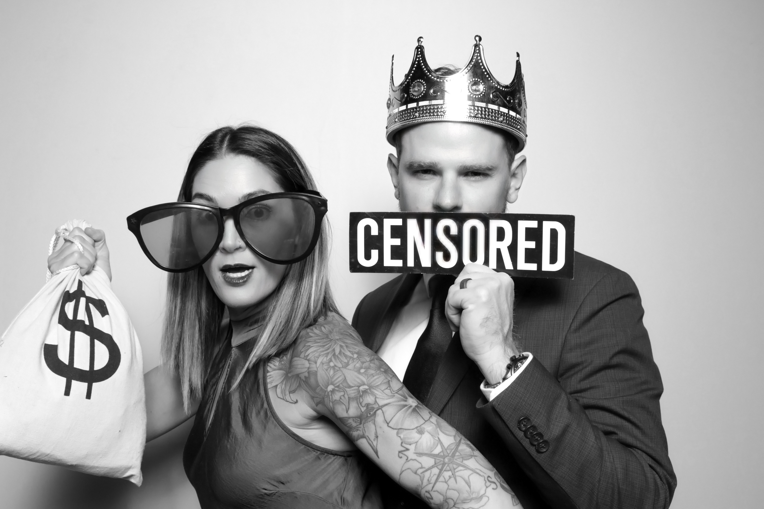 Keith's 57th — couple with crown and censored sign