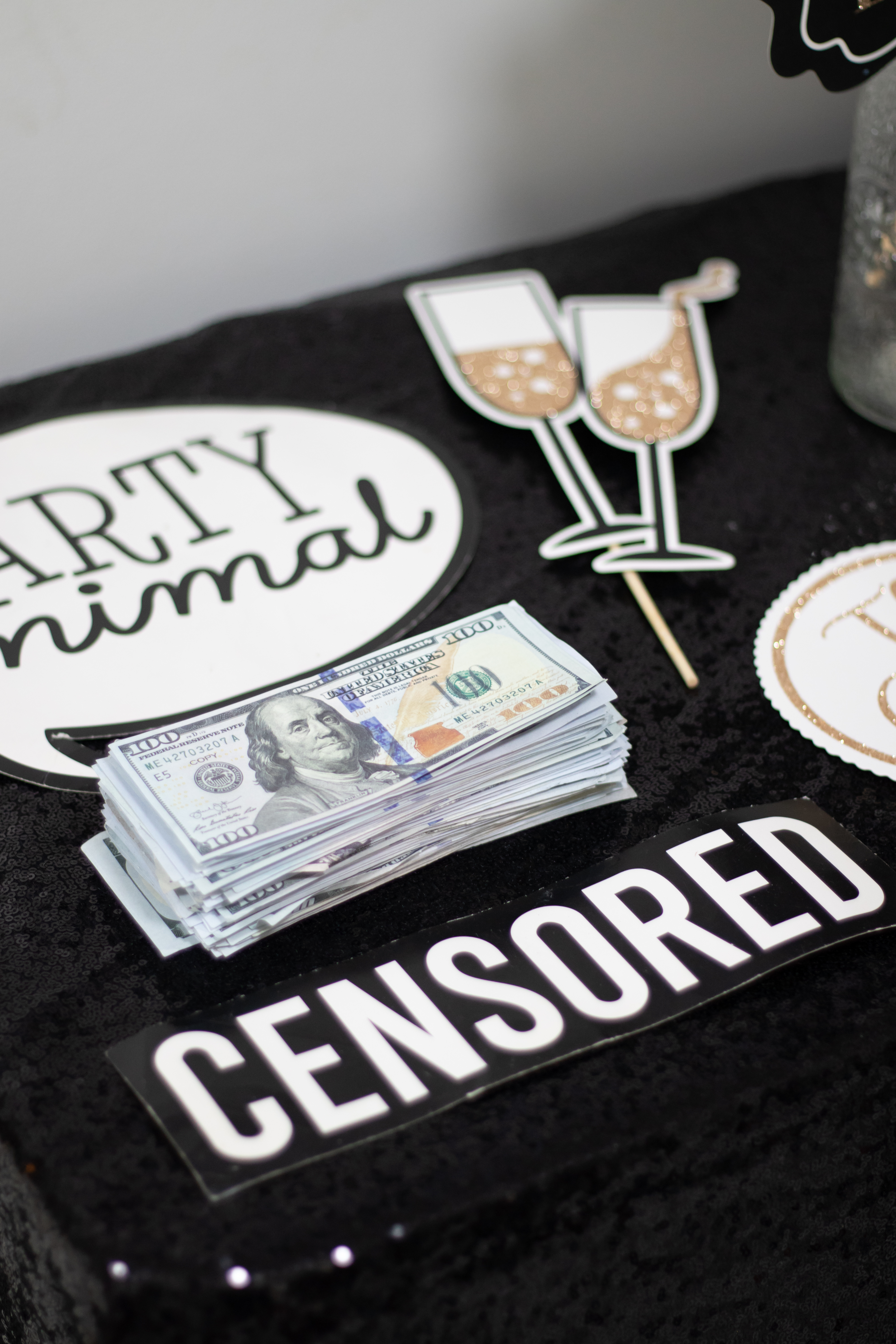 Festive Photos prop table — party signs and fun props